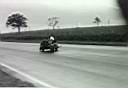 Pete Hockley and Tim Manhire on their Wildcat outfit along the back straight of Mallory Park