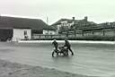 Bev Flanagan comes a cropper in the rain at the slippery Mallory hairpin 