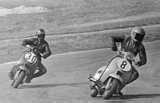 Roger Myers & Nick Barnes doing battle in the 150cc class at Lydden