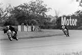 Geoff Stephens on the Wildcat 125cc 5 port Vega chasing Nev Frost